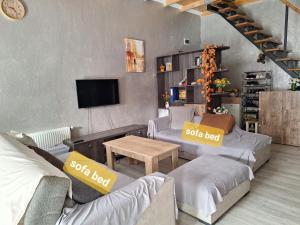Televiisor ja/või meelelahutuskeskus majutusasutuses Chase Dream Hostel追梦空间