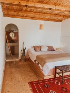 Postel nebo postele na pokoji v ubytování Dreamsea Imsouane Morocco