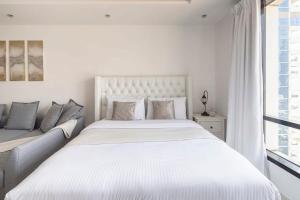 Postel nebo postele na pokoji v ubytování Frank Porter - Al Waleed Paradise