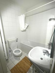 Koupelna v ubytování Apartment KOZOLEC - best central location