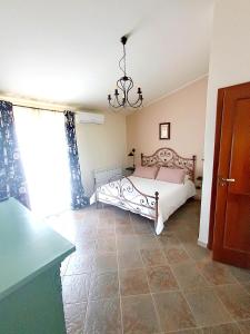 Postel nebo postele na pokoji v ubytování LA Casa di Matilde