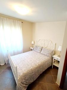 Postel nebo postele na pokoji v ubytování LA Casa di Matilde