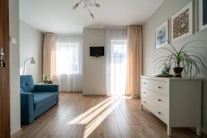TV a/nebo společenská místnost v ubytování VERTUS