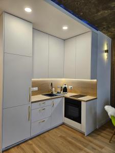 Η κουζίνα ή μικρή κουζίνα στο Lunar Luxury Appartment Boulevard View High Street +20 φωτογραφίες
