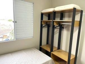 a room with two bunk beds and a window at Oásis Urbano - Expo Center Norte in Sao Paulo