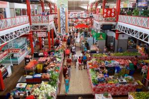 an overhead view of a market with people walking through it at F3 Papeete centre-ville in Papeete