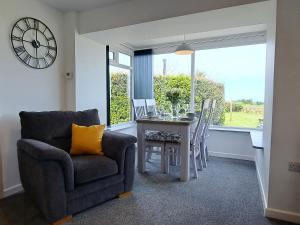 Khu vực ghế ngồi tại Wellfield Cottage