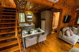 Köök või kööginurk majutusasutuses Casa na Árvore em Gramado