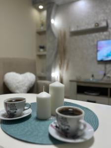 TV a/nebo společenská místnost v ubytování Tea i Una