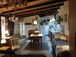 Posezení v ubytování Casa della Quercia + 22 fotografií