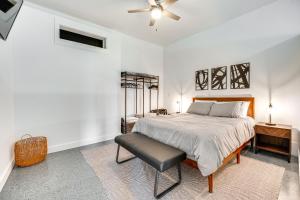 a bedroom with a bed and a chair at Pasco Studio Vacation Rental with Private Patio! in Pasco