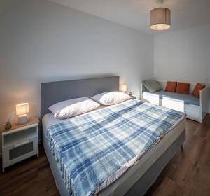 Postel nebo postele na pokoji v ubytování Ferienwohnung Spital am Pyhrn