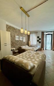 a bedroom with two beds in a room at Giulivi Assisi Apartments in Assisi