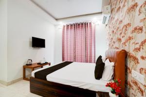 TV a/nebo společenská místnost v ubytování Hotel O Alankrita Resort