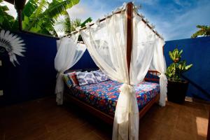 Postel nebo postele na pokoji v ubytování Casa Brisa - WiFi, PISCINA e CAFÉ DA MANHÃ a 520m do CENTRO DE ARRAIAL