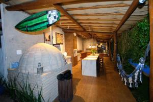 Posezení v ubytování Casa Brisa - WiFi, PISCINA e CAFÉ DA MANHÃ a 520m do CENTRO DE ARRAIAL