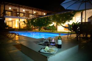 Bazén v ubytování Casa Brisa - WiFi, PISCINA e CAFÉ DA MANHÃ a 520m do CENTRO DE ARRAIAL nebo v jeho okolí