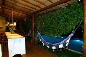 Bazén v ubytování Casa Brisa - WiFi, PISCINA e CAFÉ DA MANHÃ a 520m do CENTRO DE ARRAIAL nebo v jeho okolí
