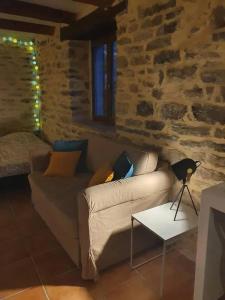 Istumisnurk majutusasutuses Appartement d'une chambre avec piscine partagee jardin clos et wifi a Pompignan