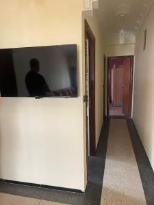 TV a/nebo společenská místnost v ubytování Charmant appartement à Hassan