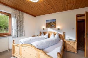 Postel nebo postele na pokoji v ubytování Ferienhaus Am Steindl "Steindlhof"