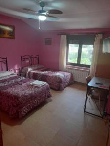 Postel nebo postele na pokoji v ubytování Hotel El Molino
