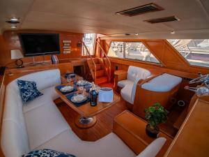 a view of the inside of a boat with a table at Hyperia in Valencia