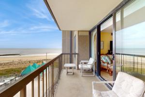 a balcony with a view of the beach at Sea Colony - Georgetowne House 409 in Bethany Beach