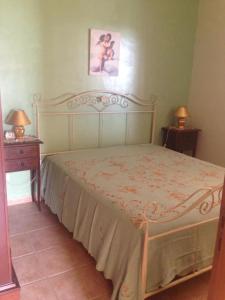 Giường trong phòng chung tại Villa vicino Mare