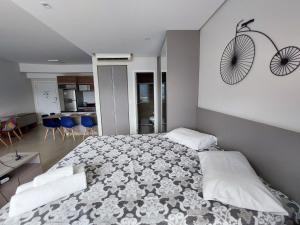 Postel nebo postele na pokoji v ubytování BOOK SANTOS - Unlimited 1710 - Beira Mar c/ vista