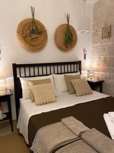 Postel nebo postele na pokoji v ubytování Grezze Mura