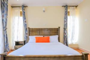 Voodi või voodid majutusasutuse Munyonyo serviced apartments toas