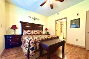 a bedroom with a bed and a ceiling fan at Abundantly Blessed Mountain View 3604 in Pigeon Forge