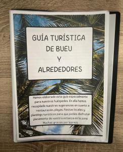 un signo que dice guía turkishica de bueulez aleded en Apartamento Centroplaya, en Bueu