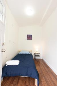 Кровать или кровати в номере 3-Bed Luxurious Home Close to NYC