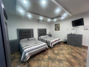 Postel nebo postele na pokoji v ubytování GR20acd Elva