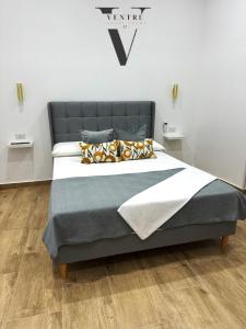 Posteľ alebo postele v izbe v ubytovaní Ventre luxury rooms