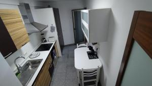 Una cocina o zona de cocina en CASA JOSE "Acogedor Apartamento cerca de la playa"