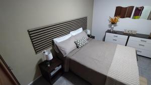 Cama o camas de una habitación en CASA JOSE "Acogedor Apartamento cerca de la playa"