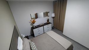 Cama o camas de una habitación en CASA JOSE "Acogedor Apartamento cerca de la playa"