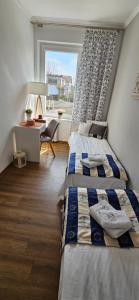Posteľ alebo postele v izbe v ubytovaní Apartament Gdańska 19 blisko morza