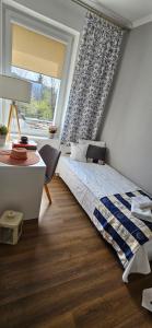 Posteľ alebo postele v izbe v ubytovaní Apartament Gdańska 19 blisko morza