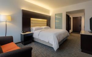 Postel nebo postele na pokoji v ubytování Sheraton Bogotá Hotel