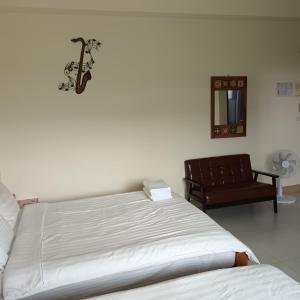 Voodi või voodid majutusasutuse Huitaro Homestay toas