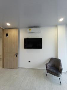 TV a/nebo společenská místnost v ubytování RB Hotel