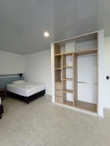 Postel nebo postele na pokoji v ubytování RB Hotel