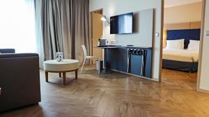 Kuchyň nebo kuchyňský kout v ubytování Radisson Blu Hotel Toulouse Airport