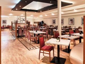 Reštaurácia alebo iné gastronomické zariadenie v ubytovaní Radisson Blu Hotel Krakow