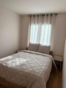 Ένα ή περισσότερα κρεβάτια σε δωμάτιο στο Superbe Appartement tout équipé, Le nid d'Eva à Metz Gare, Parking privé, Balcon, F2, 50m2, 3p