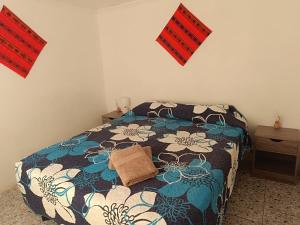 Ein Bett oder Betten in einem Zimmer der Unterkunft Misky Wasi